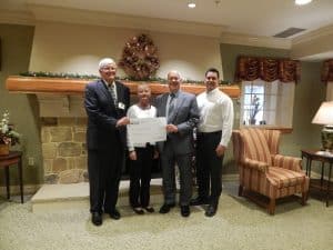 Pictured Greg Pierce(Dir. of Dev, Mennonite Home), Alice Griffe (Cope Salt, Accounting), Nelson King (CEO, Mennonite Home) and KC Kramer (AUTOBrine® Systems Manager, Cope Salt)